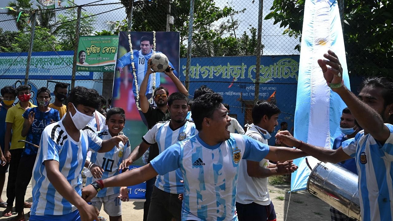 Argentina football fans celebrate in Kolkata. Credit: AFP Photo