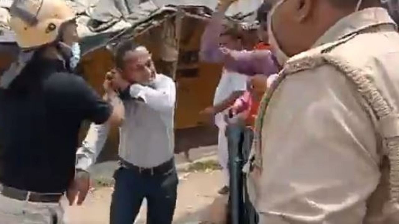 Incidents of policemen thrashing reporters were reported. Credit: Twitter Video/@suryapsingh_IAS