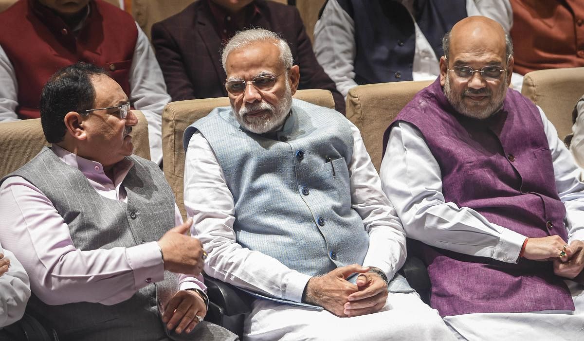 BJP National President J P Nadda, Prime Minister Narendra Modi and Union Home Minister Amit Shah. Credit: PTI File Photo