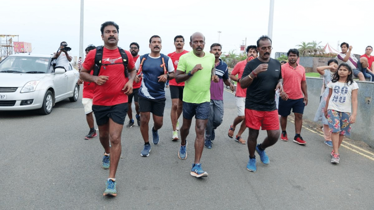 Ma Subramanian running in the marathon. Credit: Special Arrangement