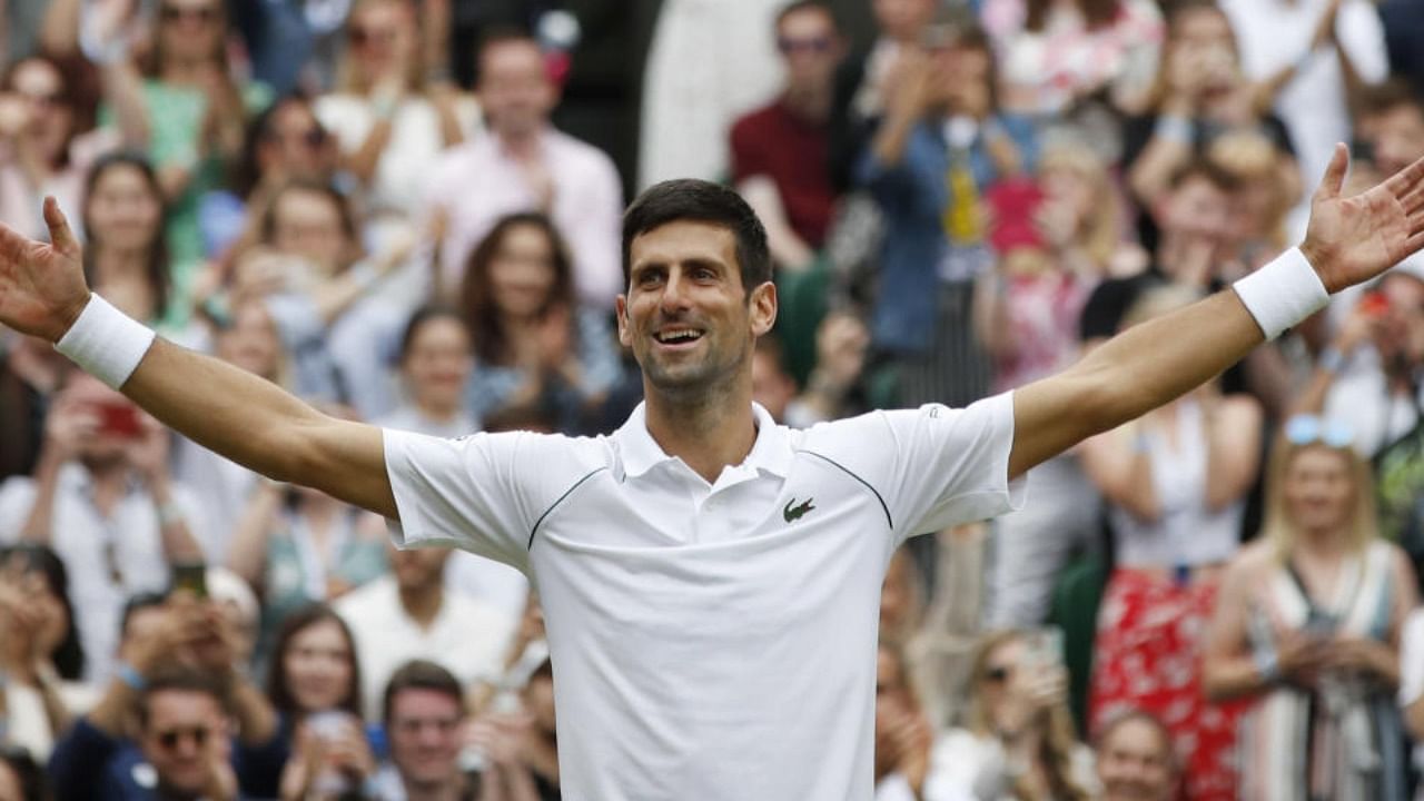 Serbia's Novak Djokovic celebrates winning his final match against Italy's Matteo Berrettini. Credit: Reuters Photo