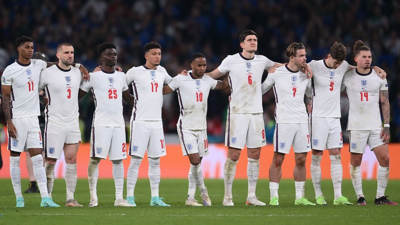 England's players watch the penalty shoot out during the Euro 2020 final. Credit: AFP Photo