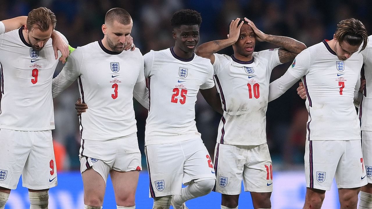 England's players watch the penalty shootout during the Euro 2020 final. Credit: AFP Photo