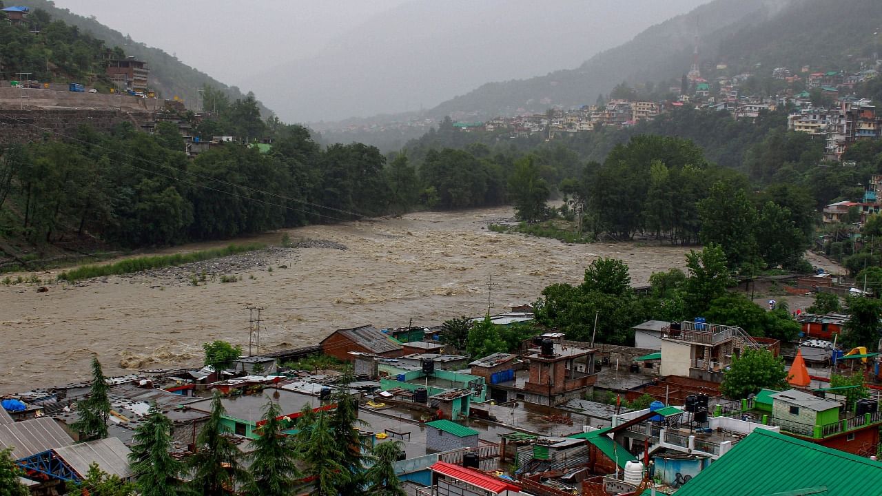 A Swollen Beas river due to continuous rain in Kullu, Himachal Pradesh. Credit: PTI Photo