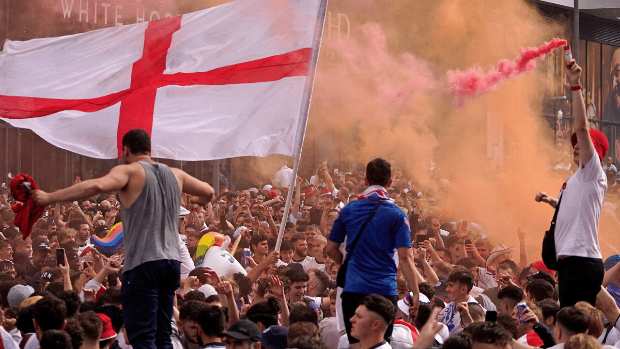 England fans cheer on their team outside Wembley Stadium ahead of the UEFA EURO 2020 final football match. Credit: AFP Photo