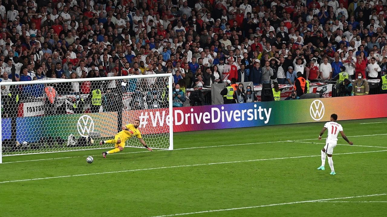 Rashford misses a penalty during the shoot-out. Credit: Reuters Photo