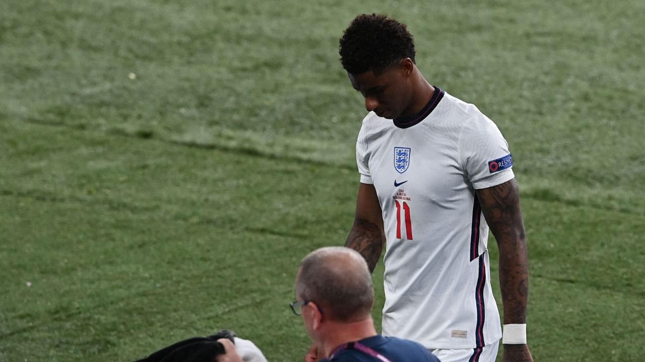 Glorious football marred by hooliganism, racism. Credit: AFP Photo