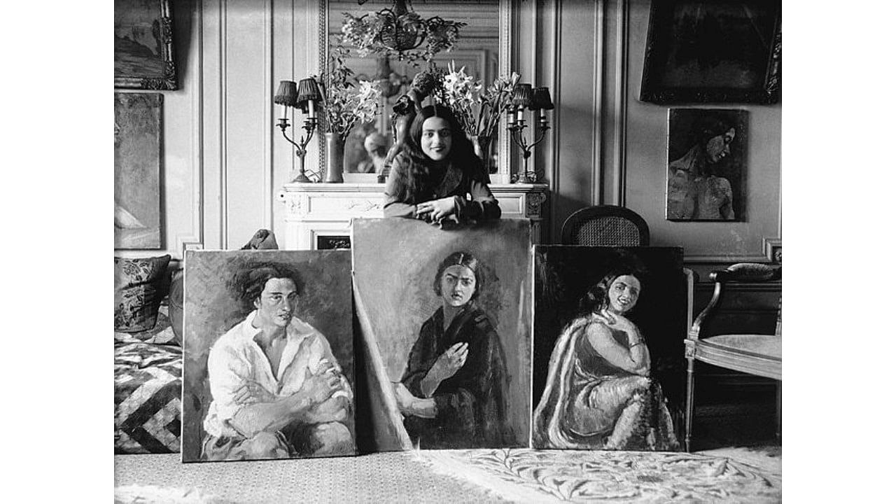  Amrita Sher-Gil with three paintings. Credit: Wikimedia Commons.