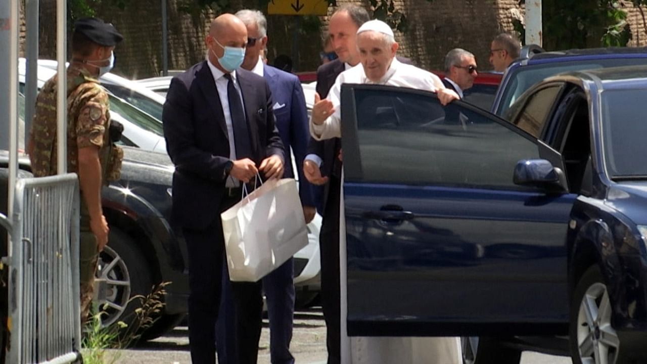  Pope Francis leaves the car to greet policemen before entering the Vatican after being discharged from Gemelli hospital in this screengrab taken from a video in Rome, Italy. Credit: Reuters Photo