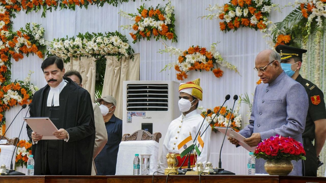 Former union minister Ramesh Bais takes oath as Governor of Jharkhand, administered by Chief Justice of State High Court Dr. Ravi Ranjan, at Raj Bhawan in Ranchi. Credit: PTI Photo