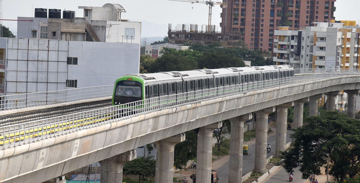 A metro train runs on the extended line between Yelachenahalli and Anjanapura in Bengaluru during a trial run on August 27. DH PHOTO/S K DINESH