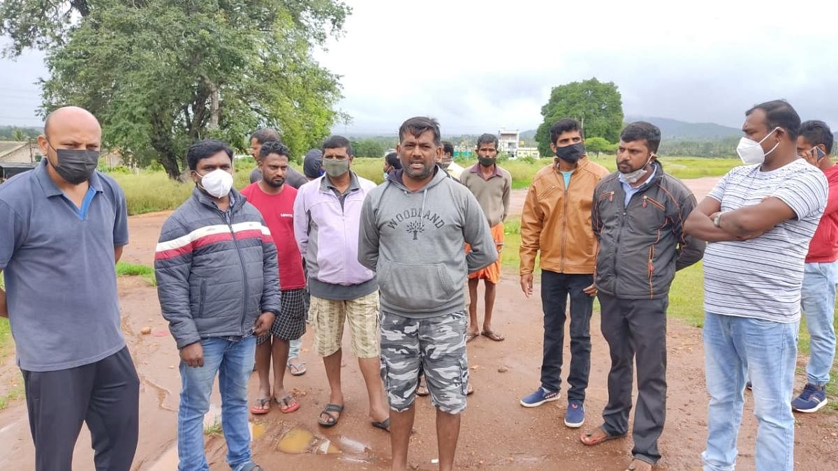 Residents stage a protest against the poor drainage facility in Baichanahalli.