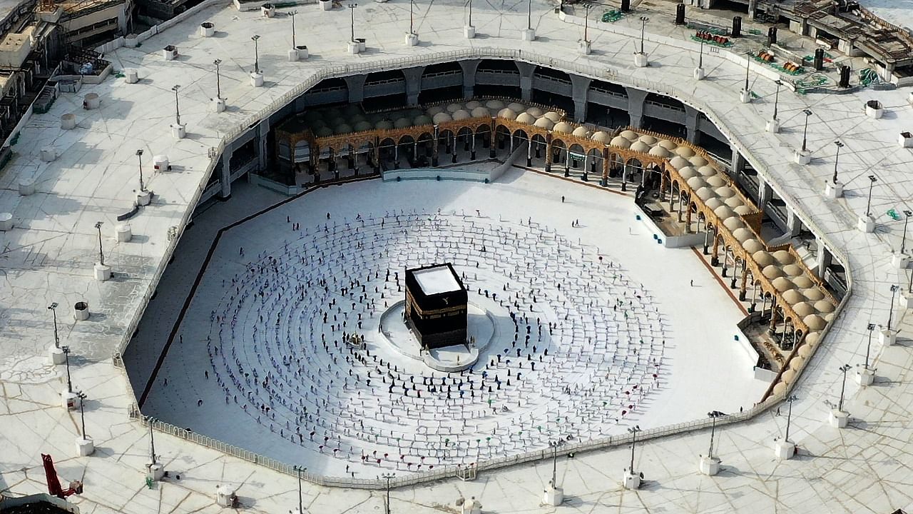 The first ritual requires walking seven times around the Kaaba. Credit: AFP File Photo