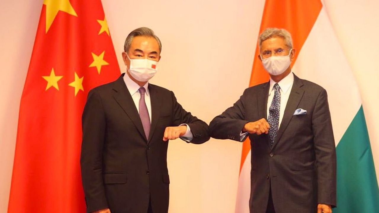 External Affairs Minister S Jaishankar and his Chinese counterpart Wang Yi. Credit: Twitter/@DrSJaishankar 