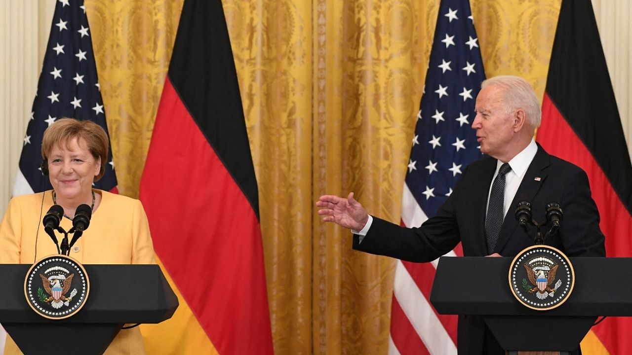US President Joe Biden and German Chancellor Angela Merkel. Credit: AFP Photo