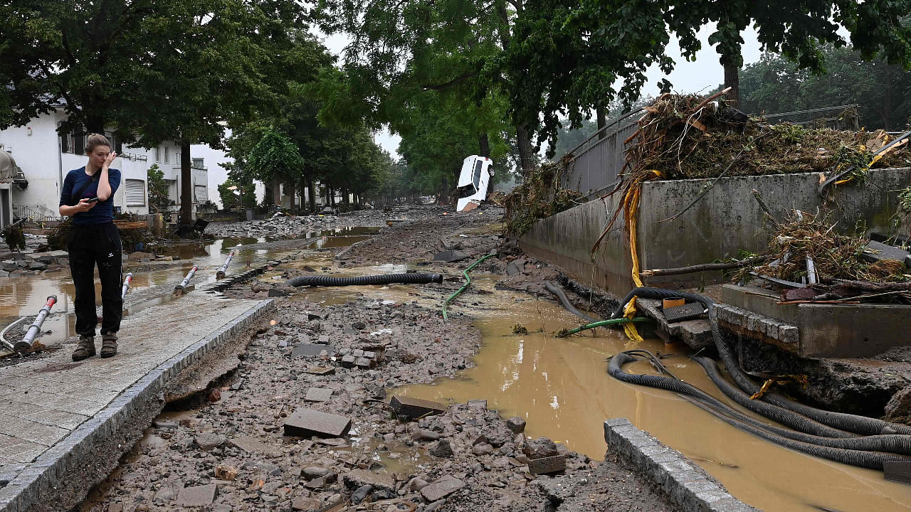 Entire communities lie in ruins after river water swept through towns and villages. Credit: AFP Photo