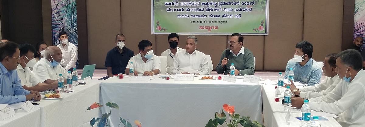The irrigation advisory committee meeting was held in Kushalnagar on Friday. District In-charge Minister V Somanna and others look on.