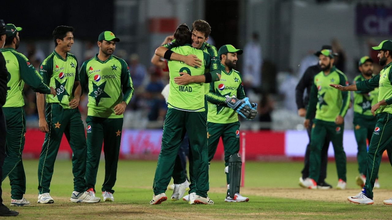 Pakistan's Shaheen Shah Afridi (C) celebrates with teammates after taking the final wicket during the first T20 against England at Trent Bridge, Nottingham. Credit: AFP Photo