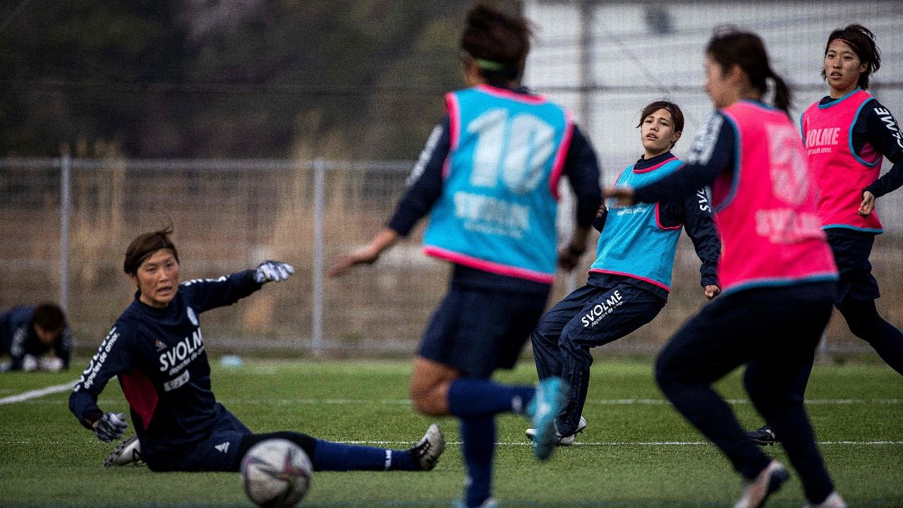 Players from Japan's women football team Chifure AS Elfen Saitama playing during a training session in Hanno, Saitama prefecture. Credit: AFP Photo