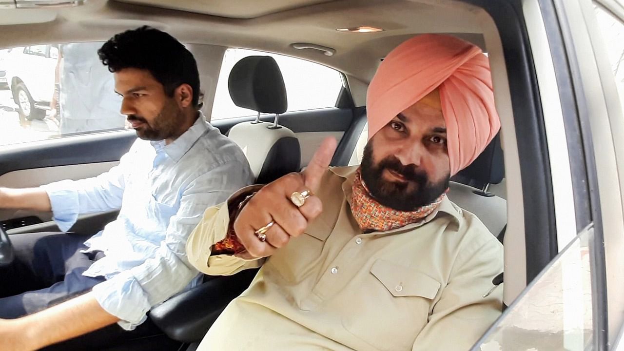 Congress leader Navjot Singh Sidhu leaves for Amritsar from his residence, in Patiala, Saturday, July 17, 2021. Credit: PTI Photo