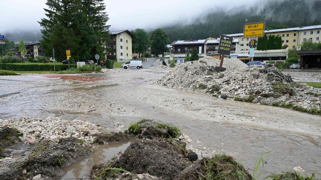 Some 65 people were evacuated in Germany's Berchtesgaden area after the Ache River swelled. Credit: AFP Photo