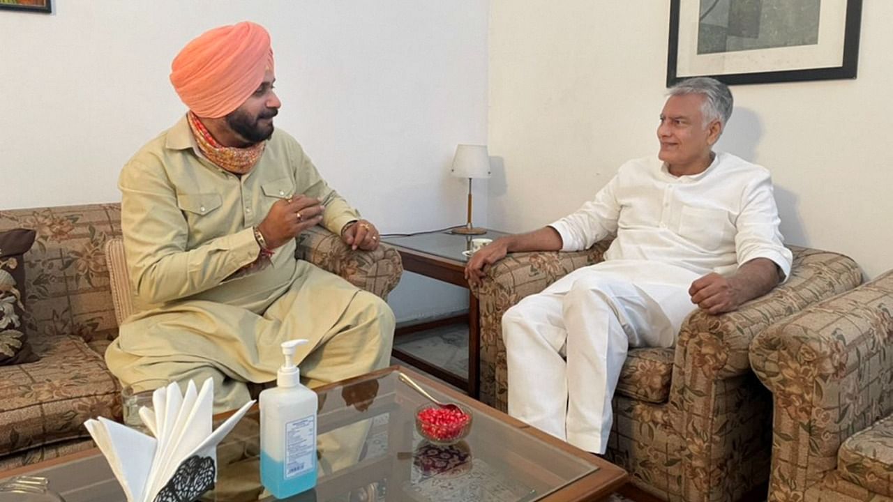 Congress leader Navjot Singh Sidhu meets Punjab Congress chief Sunil Jakhar at his residence in Panchkula, Haryana, Saturday, July 17, 2021. Credit: PTI Photo