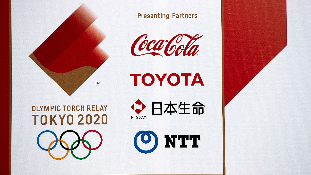 A banner advertising Coca-Cola beverages, Toyota, Nissay and NTT, Olympic Games partner for Tokyo 2020. Credit: Reuters Photo
