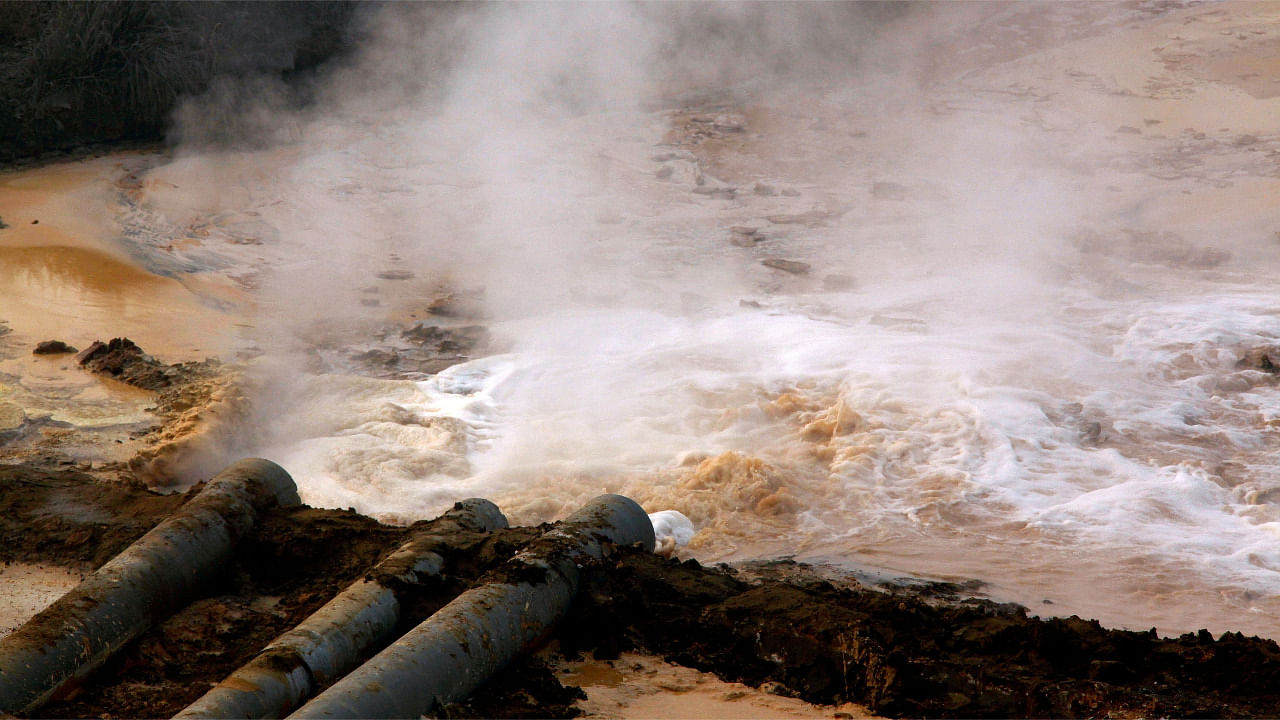 Pipes coming from a rare earth smelting plant spew polluted water into a vast tailings dam near Xinguang Village, located on the outskirts of the city of Baotou in China's Inner Mongolia. Credit: Reuters Photo