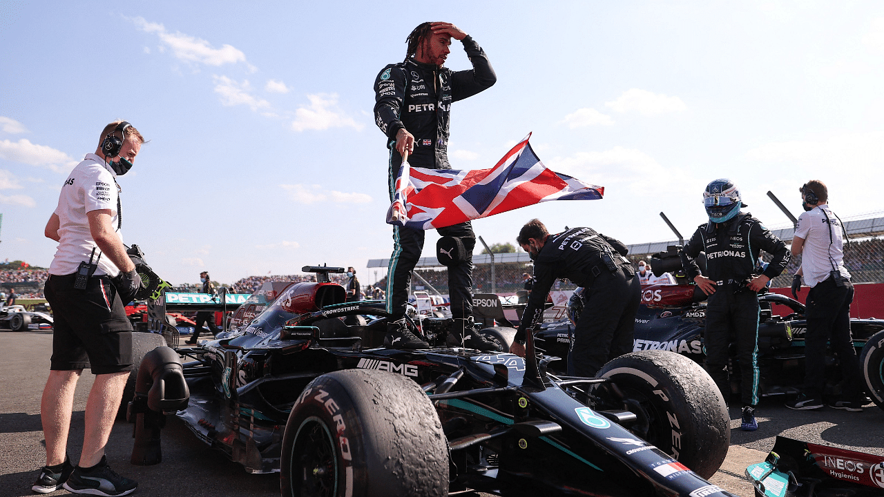 Lewis Hamilton celebrates after winning the British Grand Prix. Credit: AFP Photo