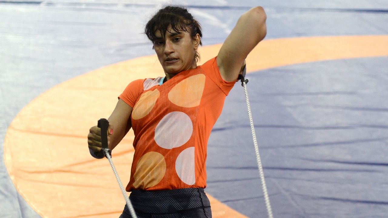 Coming from a family whose wrestling heroics inspired one of Bollywood's best-loved movies, Vinesh Phogat will be seeking to write an epic new chapter at the Tokyo Olympics. Credit: AFP Photo