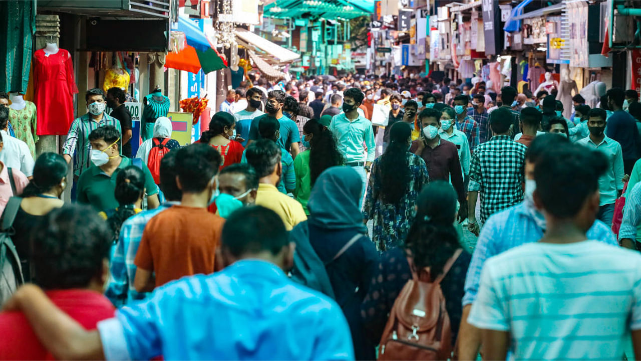 People shop at a market on the eve of Eid-ul-Adha, in Kozhikode. Credit: PTI Photo