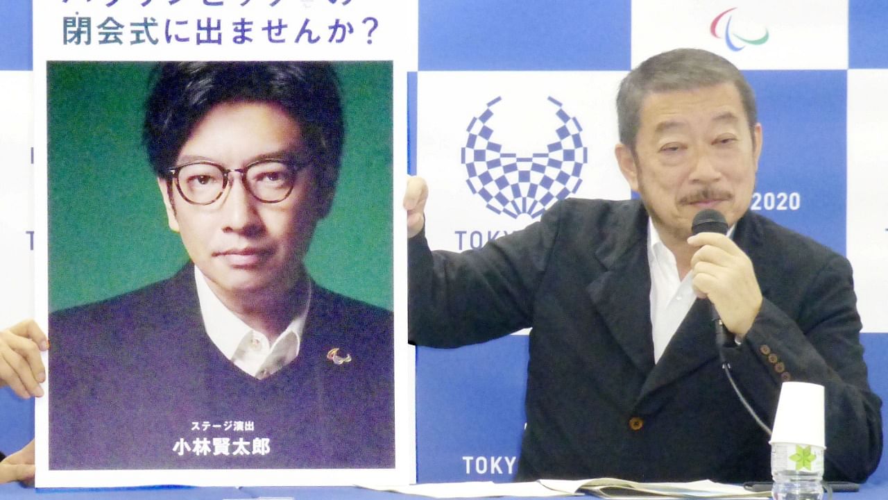 Hiroshi Sasaki, Tokyo 2020 Paralympic Games executive creative director, displays a portrait of Olympics opening ceremony show director Kentaro Kobayashi during a news conference in Tokyo, Japan, in this photo taken by Kyodo December 2019. Credit: Kyodo/Reuters
