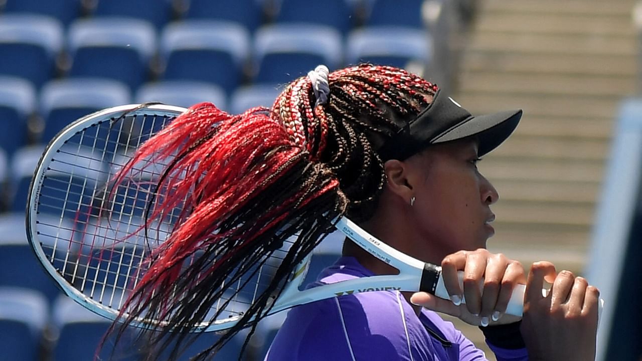 Defending champion Naomi Osaka, who withdrew from the French Open due to mental issues and skipped Wimbledon, and Roger Federer, who missed the Olympics with a knee injury, were named July 21, 2021 to the US Open tennis field. Credit: AFP Photo