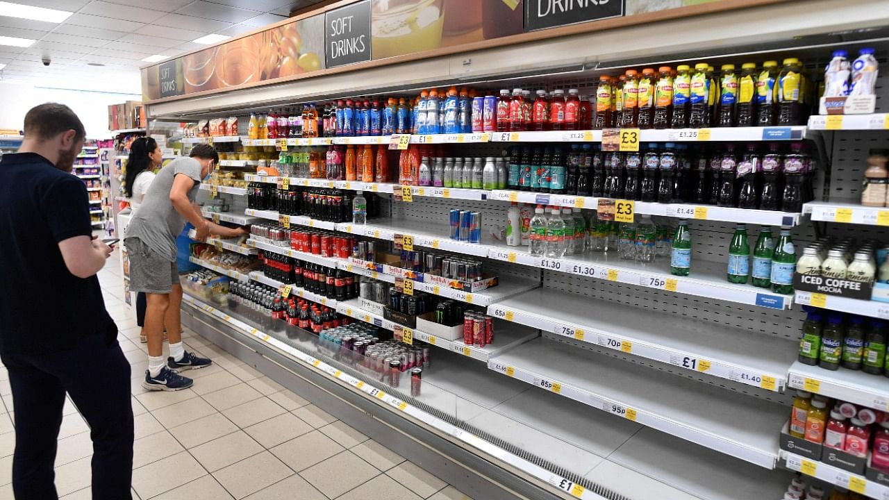 Pictures on social media showed large gaps on supermarket shelves as the “pingdemic” put pressure on retailers’ ability to maintain opening hours and stock shelves. Credit: AFP Photo