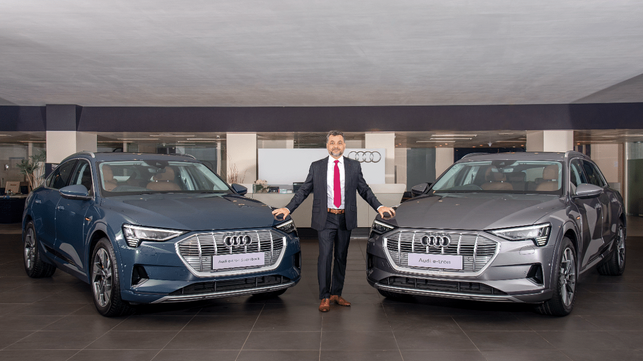 Audi India Head Balbir Singh Dhillon with the e-tron. Credit: DH Photo