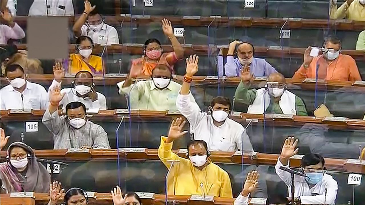 Members in the Lok Sabha during the Monsoon Session of Parliament, in New Delhi, Thursday, July 22, 2021. Credit: LSTV/PTI Photo