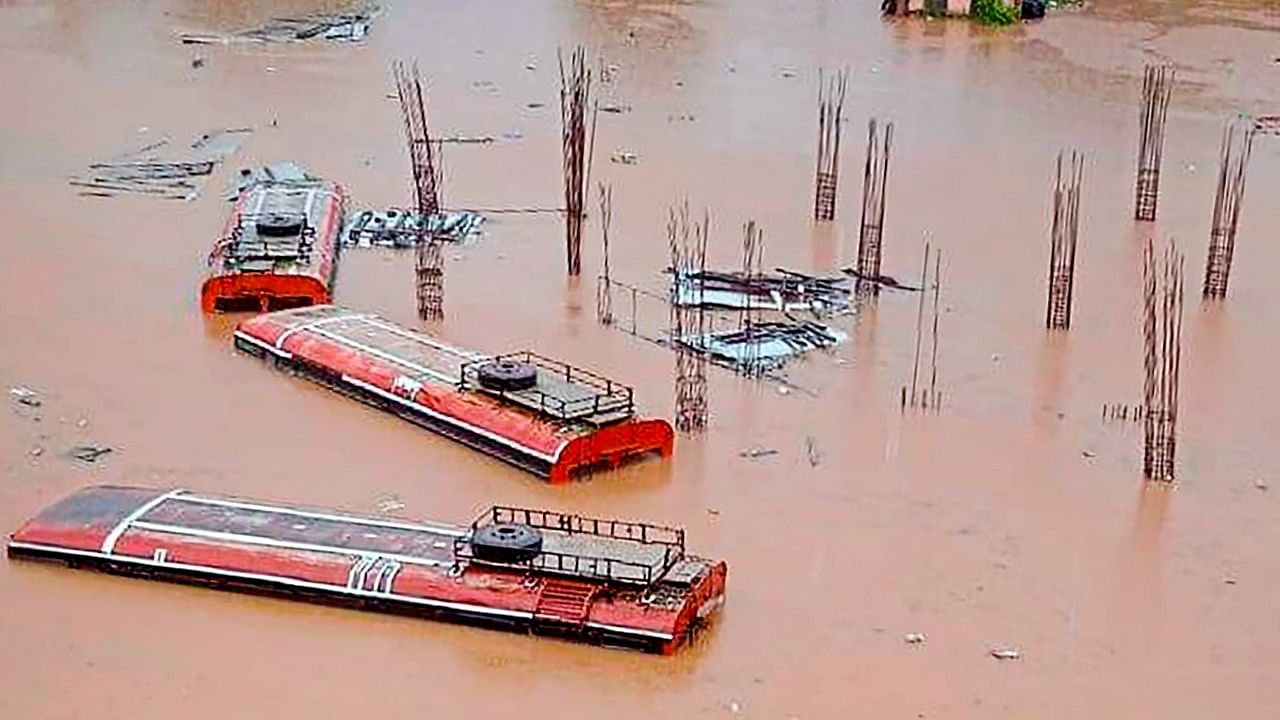 The image of the bus depot under floodwater has gone viral on social media. Credit: PTI Photo