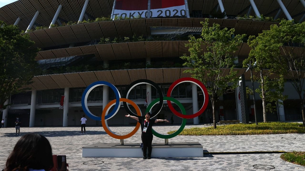 The total number of cases directly linked to the Games stood at 106 on Friday with 11 of them athletes. Credit: Reuters File Photo