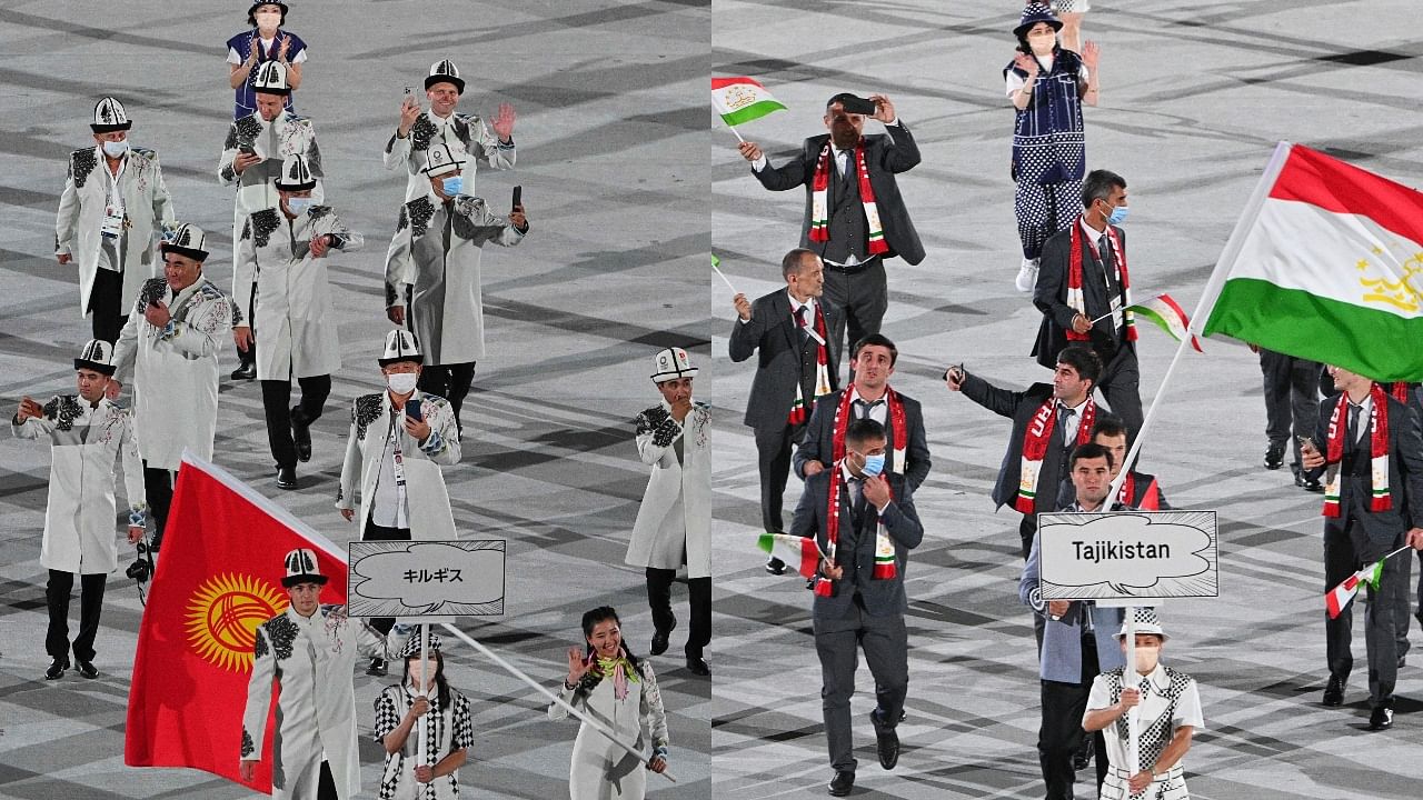 Kyrgyz (L) and Tajik contingents seen without a face mask during the Tokyo Olympics opening parade. Credit: AFP Photos