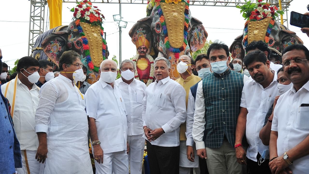 Karnataka Chief Minister B S Yediyurappa with ministers and officials during city rounds to inspect the smart city project works in Bengaluru. Credit: PTI photo