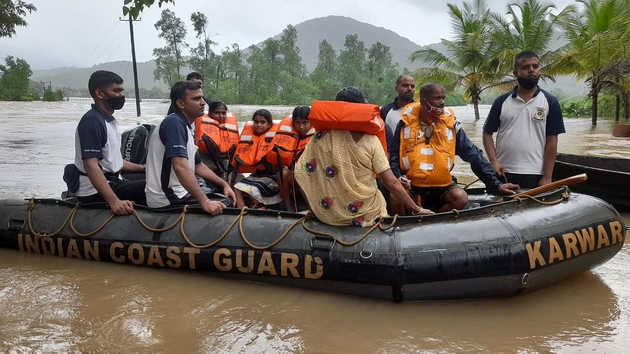 Coast Guard personnel carrying out rescue operation in flood-affected Uttara Kannada district. Credit: Indian Coast Guard Commander