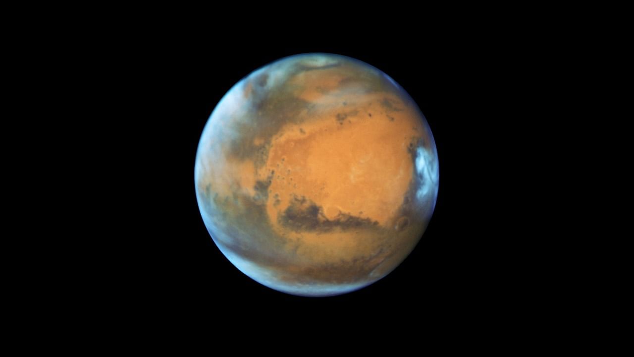 The planet Mars taken by the NASA Hubble Space Telescope when the planet was 50 million miles from Earth. Credit: NASA/Reuters Photo