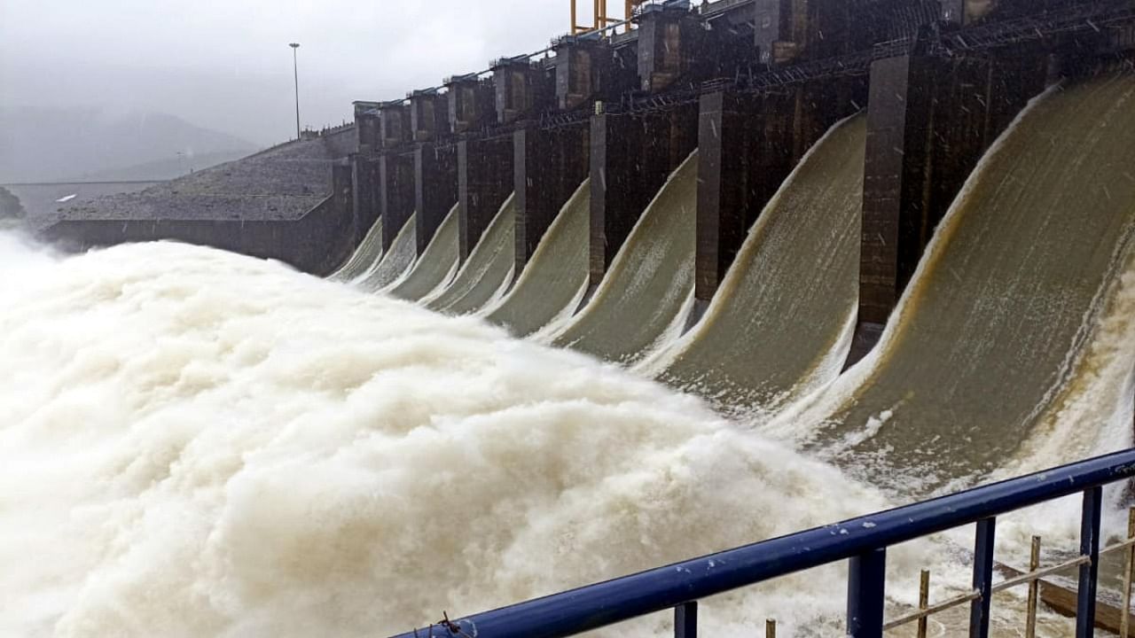 Excess water in Kadra hydel dam in Uttara Kannada being released into the Kaali River. Credit: DH Photo