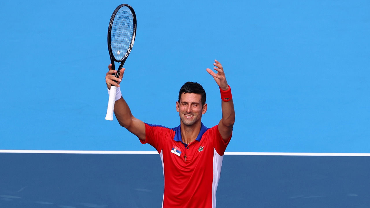 Novak Djokovic of Serbia celebrates after winning his first round match against Hugo Dellien of Bolivia. Credit: Reuters Photo
