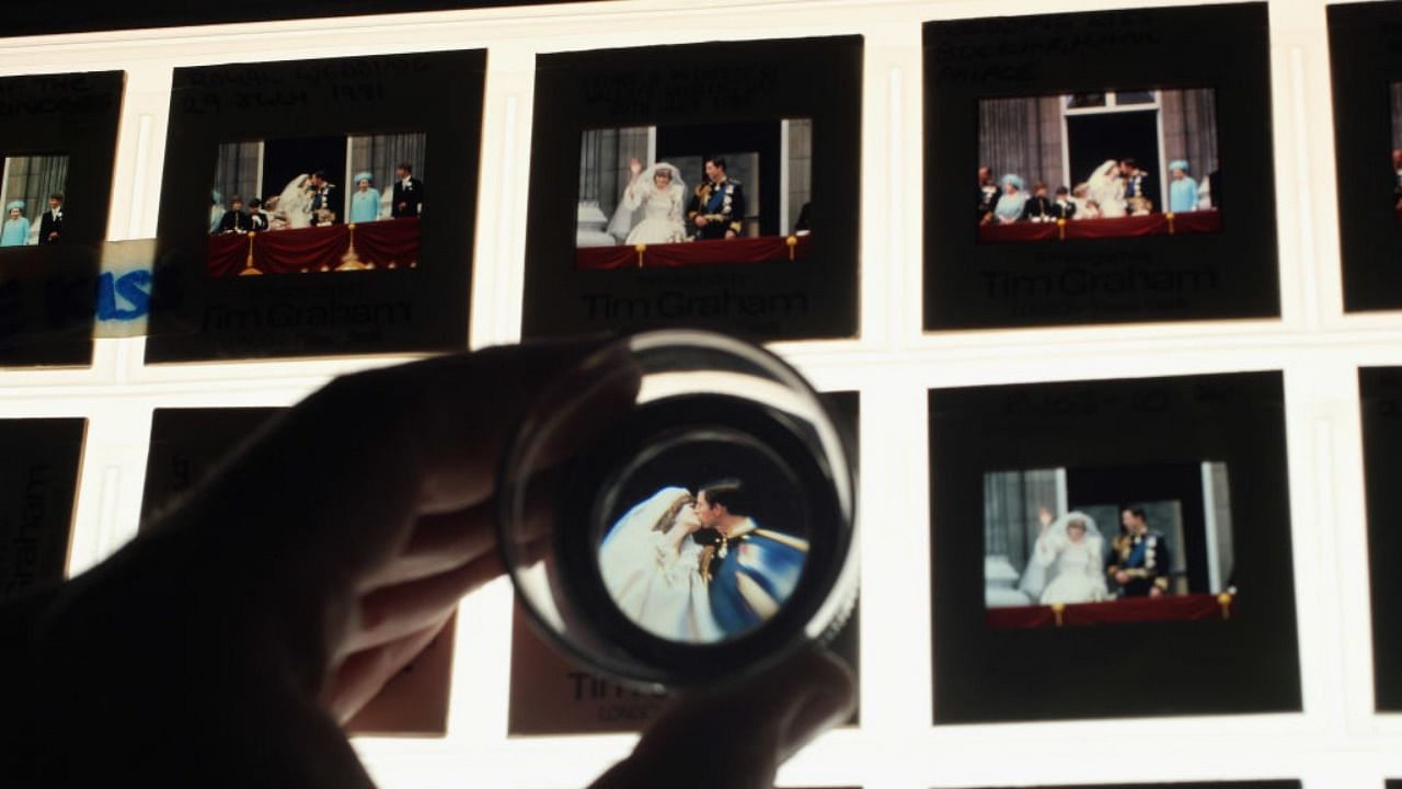 Colour slides of Prince Charles and Princess Diana's wedding kiss are laid out from the vast collection of historic photographs stored in the Hulton Archive on May 13, 2011 in London, England. The comprehensive archive contains pictures created at the birth of photography in the early 1800s and covers every era and event through to the 21st century. Staff at the Hulton Archive are employed on a wide range of jobs including: conservation, retouching, hand-printing, scanning and archiving. Credit: Getty Images