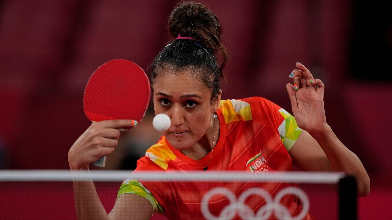 India's Manika Batra competes during the table tennis women's singles first round match against Britain's Ho Tin Tin at the 2020 Summer Olympics. Credit: AP/PTI Photo