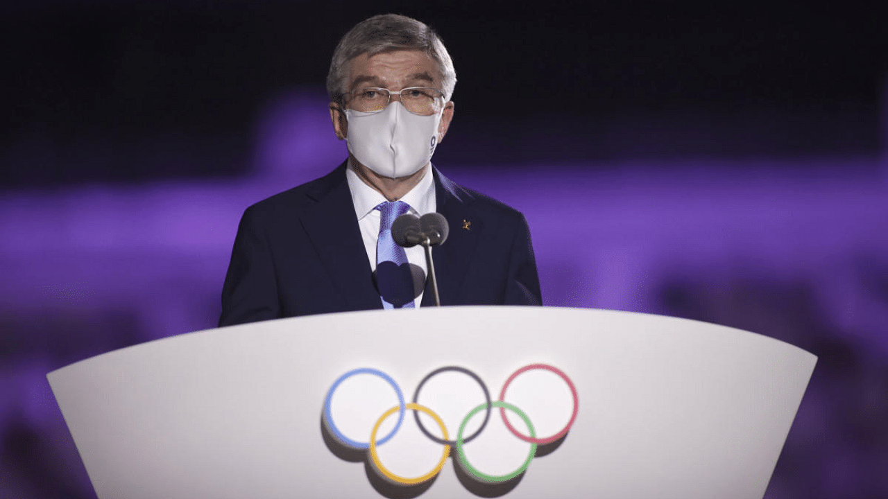Thomas Bach, president of the International Olympic Committee, speaks during the opening ceremony in the Olympic Stadium at the 2020 Summer Olympics. Credit: AP Photo