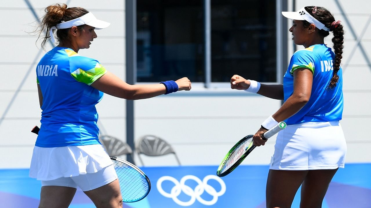 Ankita Raina and Sania Mirza react during their first round match against Lyudmyla Kichenok and Nadiia Kichenok. Credit: Reuters Photo