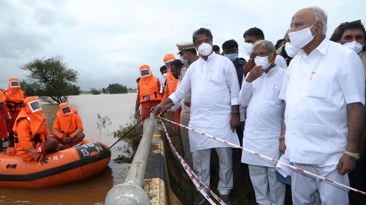 Chief Minister B S Yeddyurappa visited various places in the rain-affected area in Belgavi district on Sunday. Credit: DH Photo