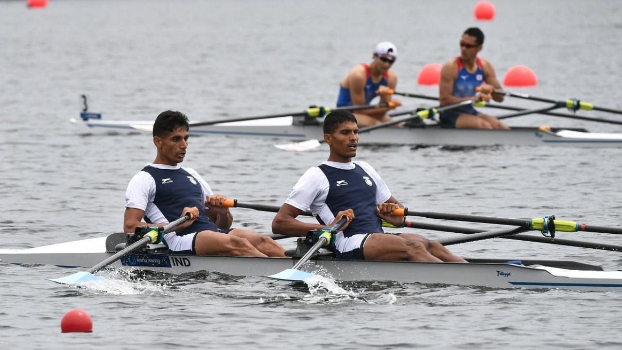 India's Arjun Lal Jat and Arvind Singh (foreground) cross the finish line in the lightweight men's double sculls heat at the 2021 World Rowing Asia-Oceania Olympic and Paralympic Continental Qualifying Regatta in Tokyo on May 6, 2021, where the Olympic and Paralympic Games events will be held. Credit: AFP File Photo